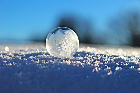 shallow focus photography of frozen water droplet thumbnail