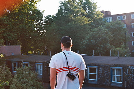 man standing on the rood thumbnail