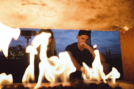 burning picture of sitting man and woman thumbnail