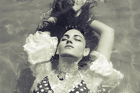 woman floating on water thumbnail