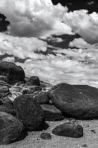 Gray Scale Photo Rocks and Clouds thumbnail
