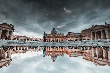 cathedral under cloudy sky during daytime thumbnail