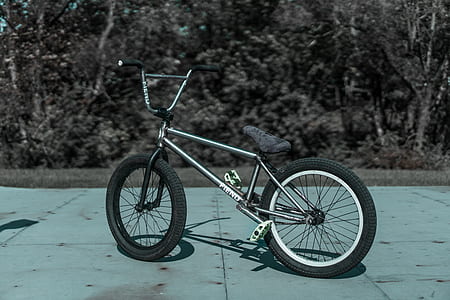 gray BMX bike outdoors during daytime thumbnail