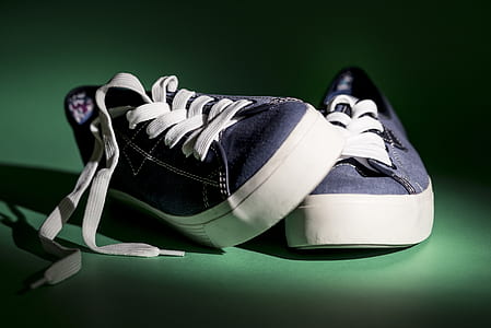 pair of blue low-top sneakers thumbnail