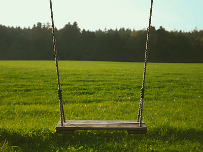brown wooden swing thumbnail