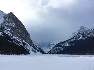 landscape photography of snow mountain under cloudy sky thumbnail