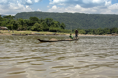 two fisherman riding on black wooden boat thumbnail