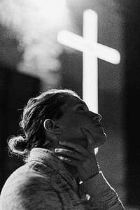 woman holding her neck thumbnail