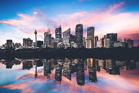 gray buildings under sunset thumbnail