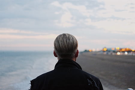 closeup photo of man facing beach thumbnail