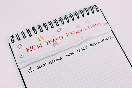 closeup photo of graphing paper with new year's resolutions priont thumbnail