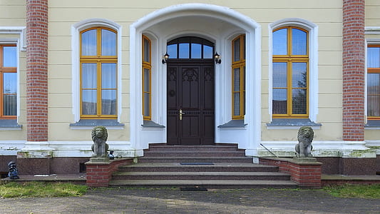 closed brown wooden door thumbnail