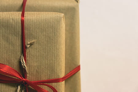 two brown packs with red lace thumbnail