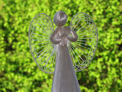 silver angel figurine thumbnail