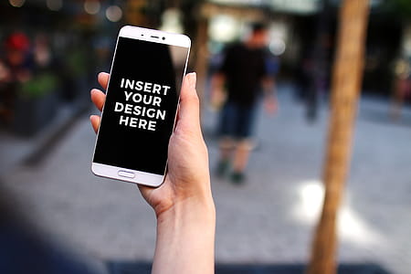 Free PSD Mockup. Xiaomi Mi5 in the hands of women thumbnail