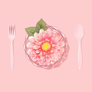 pink artificial daisy flower with pink plastic spoon and fork thumbnail