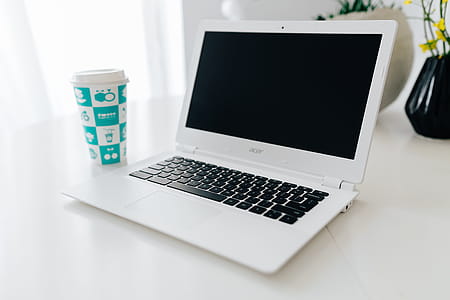 Workplace with laptop on table at home thumbnail