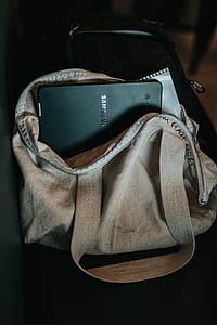 brown fabric tote bag with black Samsung laptop thumbnail