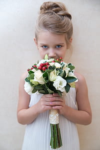 girl holding white rose bouquet thumbnail