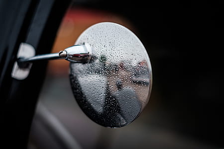 selective focus photography of chrome-colored wing mirror thumbnail