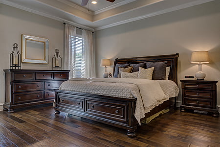 brown wooden bed frame and brown wooden nightstand thumbnail