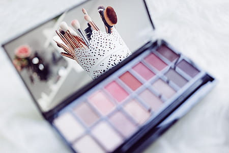 makeup palette with makeup brush set reflected on mirror thumbnail