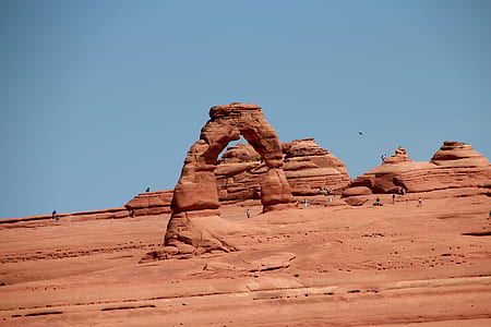 landscape of brown rock under white sky thumbnail