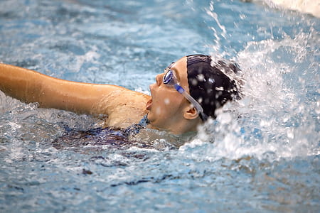 person swimming in pool thumbnail