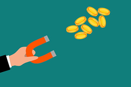 Illustration of magnet attracting metal coins. thumbnail