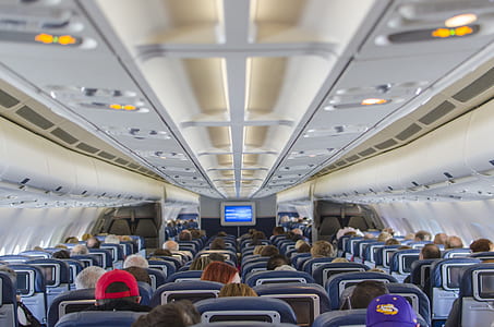 group people inside airplane thumbnail