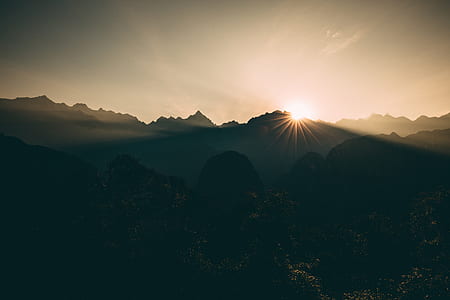sunset blocking by mountains thumbnail
