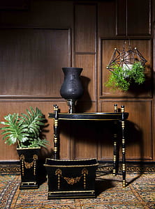Black Wooden End Table Near Square Brown and Black Wooden Pot and Rectangular Black and Brown Wooden Trunk thumbnail