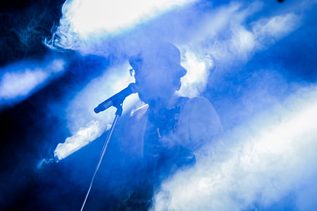 man singing while covered in fog thumbnail