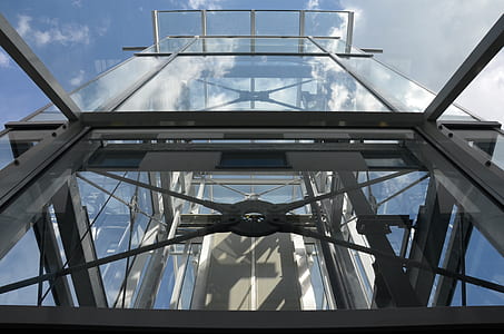 low angle photography of glass building thumbnail