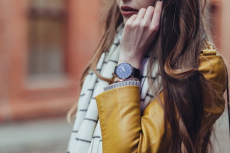 woman wearing black wrist watch thumbnail