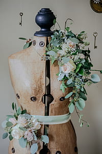 brown and black wooden dress form decor thumbnail