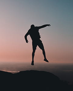 man jumping on mountain thumbnail