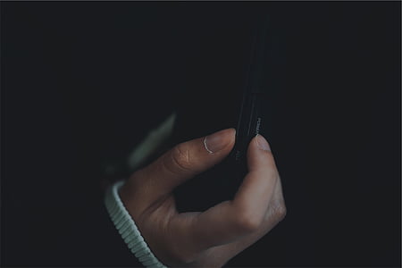 person holding black Nokia Android smartphone thumbnail