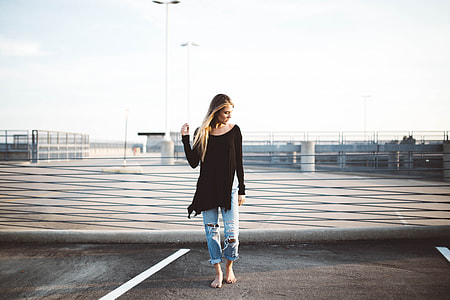 bare footed woman standing sand thumbnail