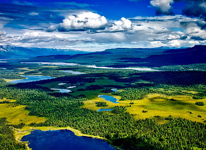 aerial photography of island and body of water thumbnail