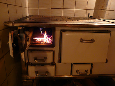 silhouette of lit stove thumbnail