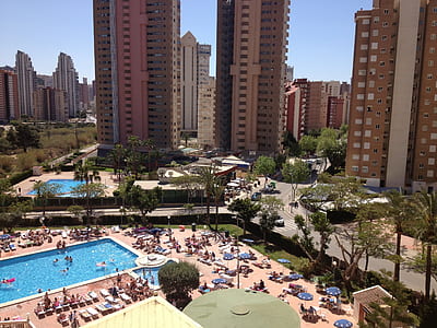 aerial photography of people near pool thumbnail