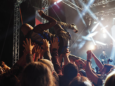 people lifting a man in black leather jacket thumbnail