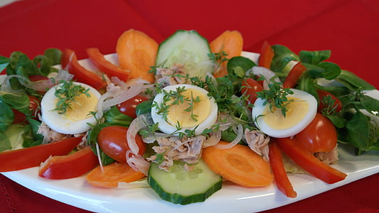salad on round white ceramic plate thumbnail
