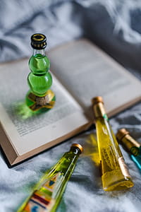 Group of colorful little bottles with liqueurs thumbnail