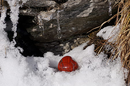 heart-shape red stone surrounded by ice thumbnail