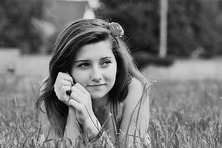 grayscale photo of wearing with flower headband on ground thumbnail