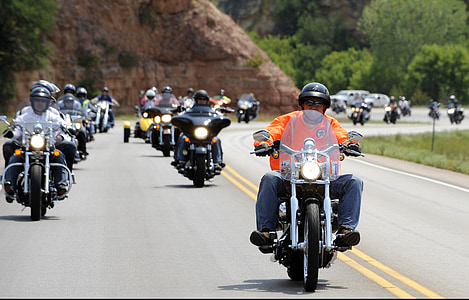 people riding touring motorcycles during daytime thumbnail