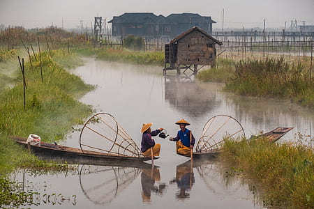 two people riding boats thumbnail