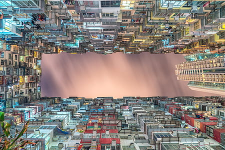 low angle photography of assorted-color buildings thumbnail